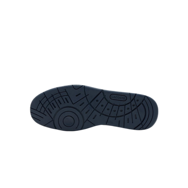 Lacoste Deviation men's white leather sneakers with navy accents and cushioned sole.